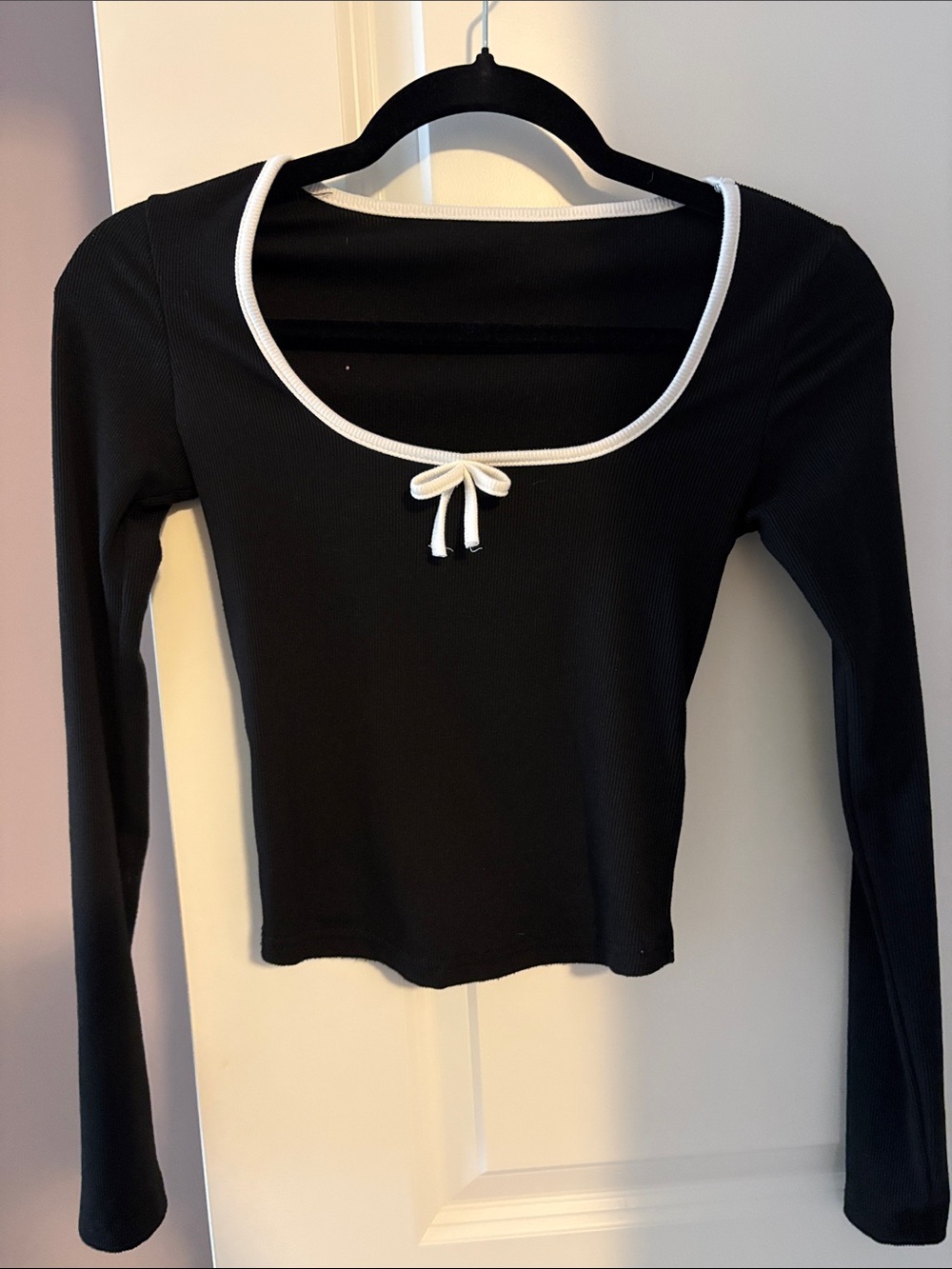 Black Long-Sleeve Scoop Neck Top with White Trim and Bow